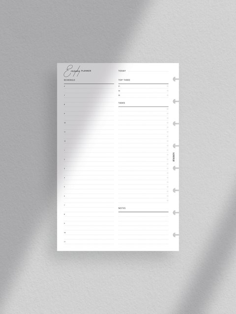 A minimalist daily planner printable. Clean and simple layout, designed for efficiency and productivity. Available in PDF format for digital download, half-letter size.