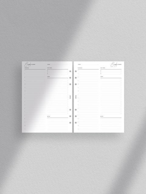 A minimalist daily planner printable. Clean and simple layout, designed for efficiency and productivity. Available in PDF format for digital download, A5 size.