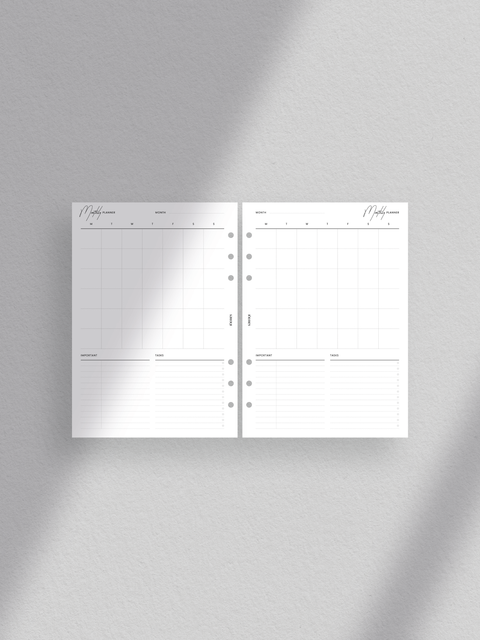 Monthly planner calendar with a vertical overview Clean, minimalist aesthetic with a touch of luxury design layout A5 size planner printable template in PDF file format Digital download for instant access Undated calendar for flexible use