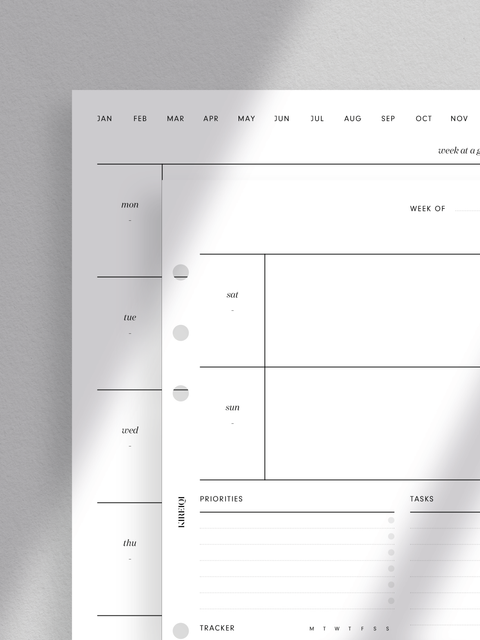 A5 size, weekly planner printable template. Digital download. PDF file. Comprehensive weekly planner featuring a week-at-a-glance section, priorities, tasks, tracker, and week-on-two-pages layout. Sleek, minimalist design. Instant digital download for convenient home printing. Perfect for maximizing productivity and achieving goals.