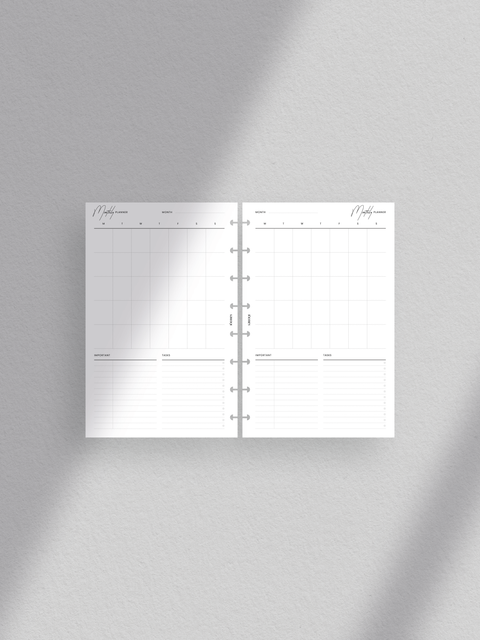 Monthly planner calendar with a vertical overview. Clean, minimalist aesthetic with a touch of luxury design. Layout Half-letter size planner printable template in PDF file format. Digital download for instant access. Undated calendar for flexible use.